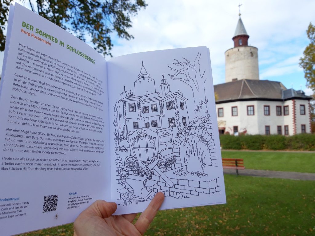 Aufgeschlagene Seite im Malbuch des Kulturpass Thüringen: Hier sieht man die Sage "Der Schmied im Schlossberge" auf Burg Posterstein